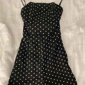 LF strapless polka dot romper with tie in the back.